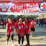Producers Bank employees at the finish line after completing the 5K run.